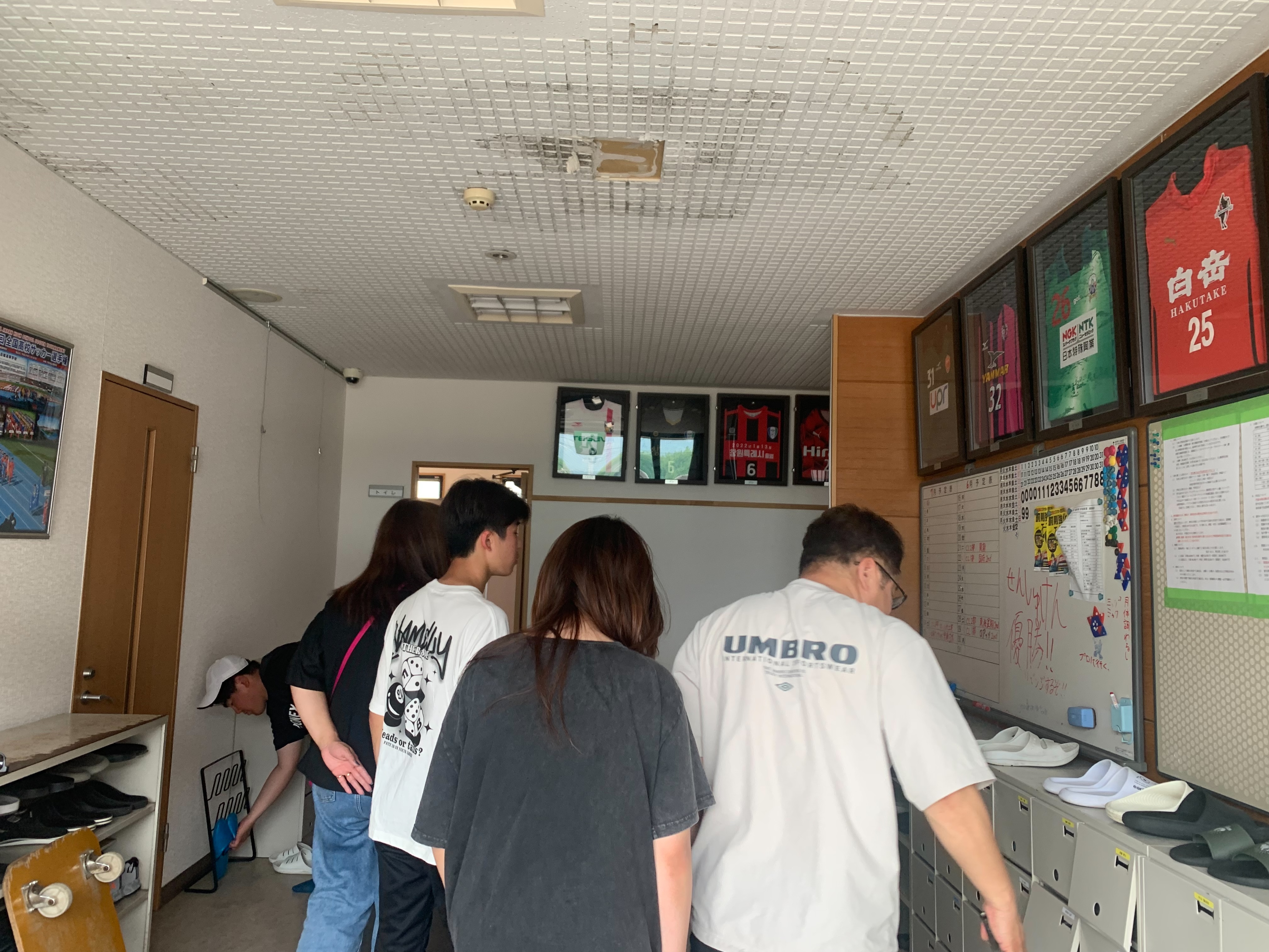 Trophy hall with professional jerseys from the school's graduates